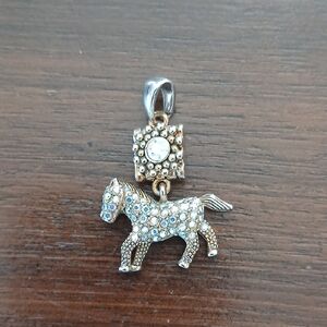 Elegant Gold and Silver Horse Pendant